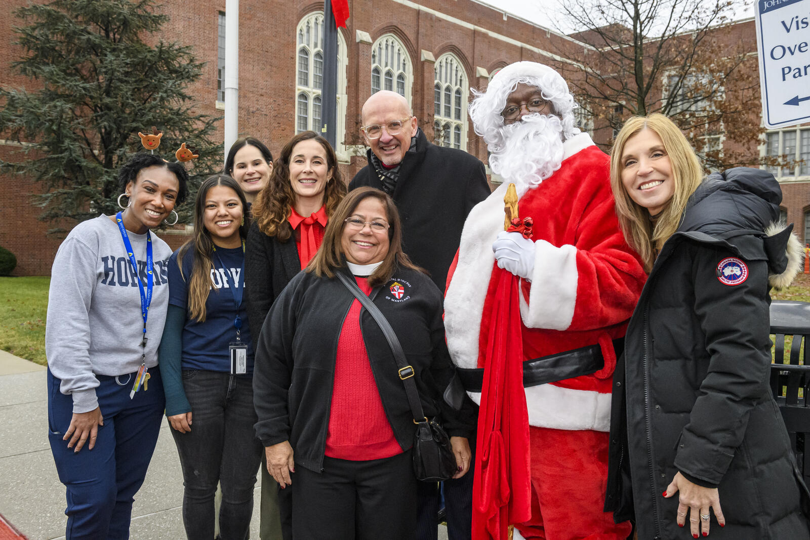 Johns Hopkins staff delivering holiday gifts to families in need