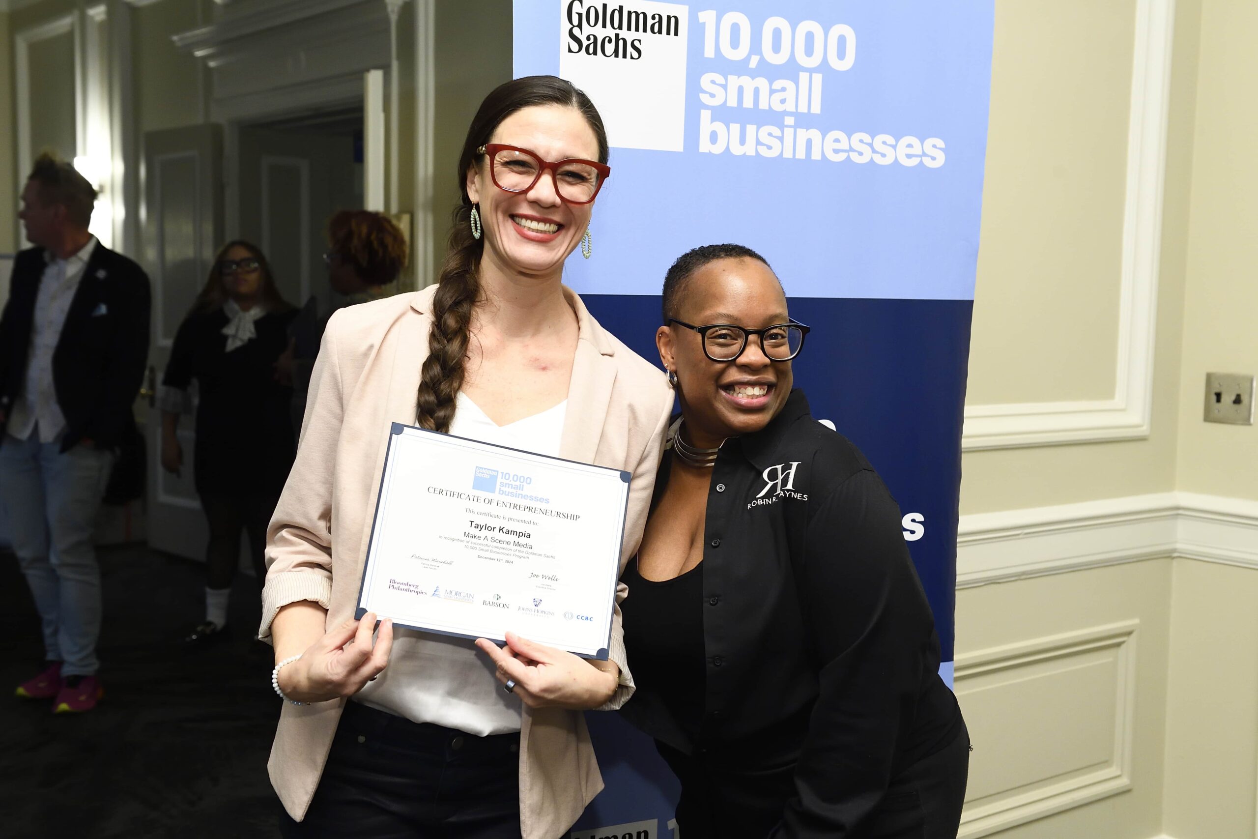 Attendees posing during a small business recognition event